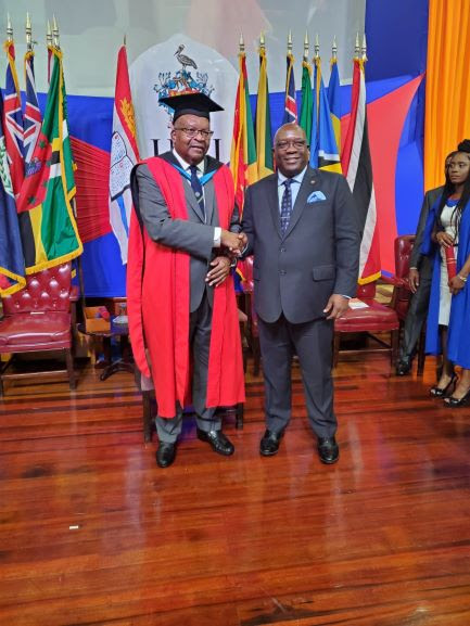 PM HARRIS CONGRATULATES SIR TAPLEY SEATON ON BEING CONFERRED HONORARY DEGREE FROM THE UNIVERSITY OF THE WEST INDIES