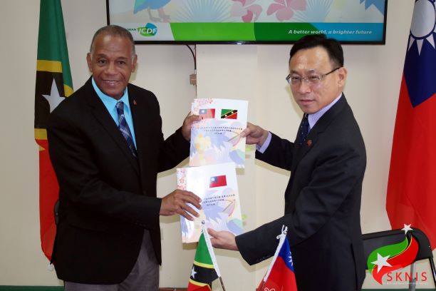 GOVERNMENT OF ST. KITTS AND NEVIS MOVES CLOSER TO ESTABLISHING A ROBUST WASTE MANAGEMENT AND RECYCLING SYSTEM L-R: HON. ERIC EVELYN; H.E. AMBASSADOR MICHAEL LIN